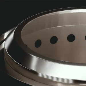 herQs Mighty rökfri eldstad i borstad metall, med runda ventilationshål och skiktad kant