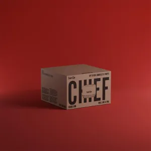 herQs CHIEF produktförpackning för rökfri firepit med varumärkesprofilerad illustration och text mot en röd studiobakgrund